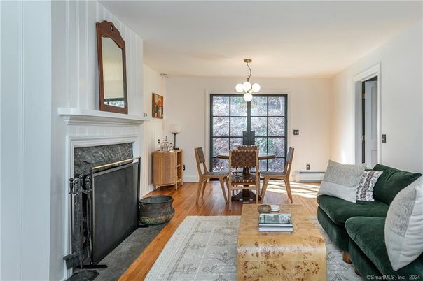 Dining room, Fireplace, Interior, Living room, Pendant Lights, Wood Texture Flooring
