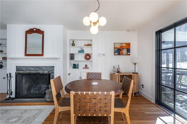 Dining room, Fireplace, Interior, Pendant Lights, Wood Texture Flooring