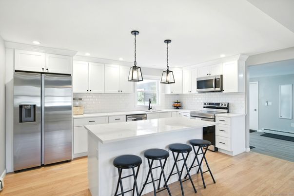 Interior, Kitchen, Pendant Lights, Recessed Lighting, Stainless Steel Appliances, Wood Texture Flooring
