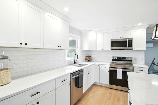 Interior, Kitchen, Recessed Lighting, Stainless Steel Appliances, Wood Texture Flooring