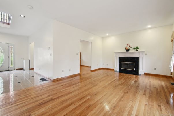 Empty room, Fireplace, Interior, Recessed Lighting, Wood Texture Flooring