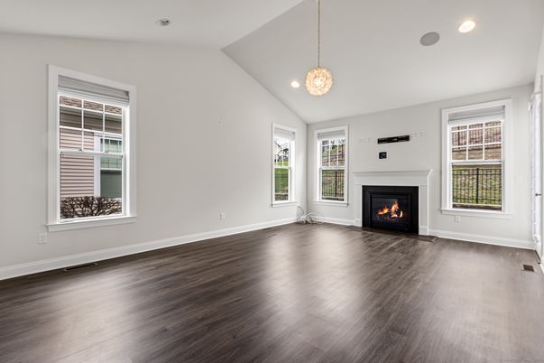 Empty room, Fireplace, Interior, Pendant Lights, Recessed Lighting, Wood Texture Flooring