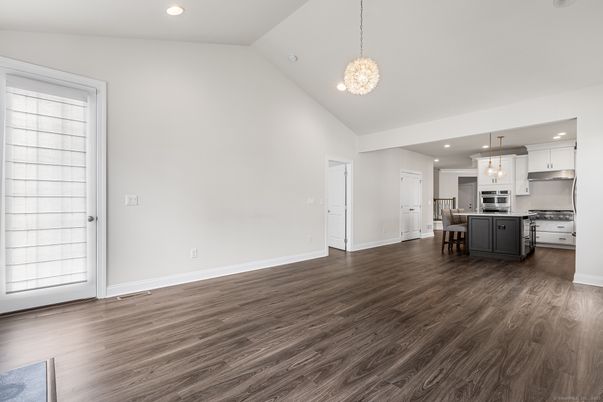 Chandelier, Dining room, Interior, Kitchen, Pendant Lights, Recessed Lighting, Stainless Steel Appliances, Wood Texture Flooring