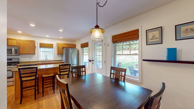 Dining room, Interior, Kitchen, Pendant Lights, Recessed Lighting, Stainless Steel Appliances, Wood Texture Flooring