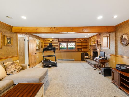 Fireplace, Fitness Equipment, Interior, Living room, Piano, Recessed Lighting, Wooden Beams