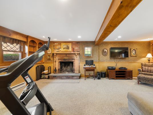 Fireplace, Fitness Equipment, Interior, Recessed Lighting, Stone Walls, Wooden Beams