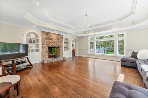 Fireplace, Interior, Pendant Lights, Recessed Lighting, Stone Walls, Wood Texture Flooring