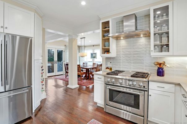 Dining room, Interior, Kitchen, Pendant Lights, Recessed Lighting, Stainless Steel Appliances, Wood Texture Flooring