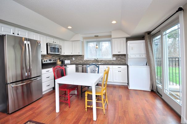 Dining room, Interior, Kitchen, Recessed Lighting, Stainless Steel Appliances, Wood Texture Flooring