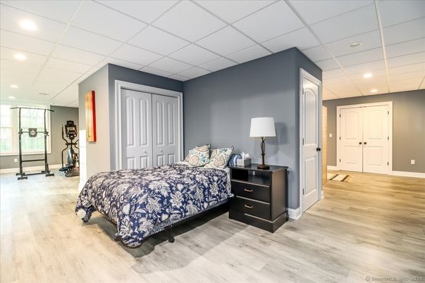 Bedroom, Fitness Equipment, Interior, Recessed Lighting, Wood Texture Flooring