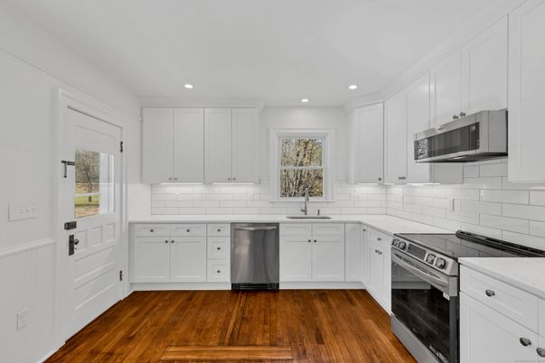 Interior, Kitchen, Recessed Lighting, Stainless Steel Appliances, Wood Texture Flooring