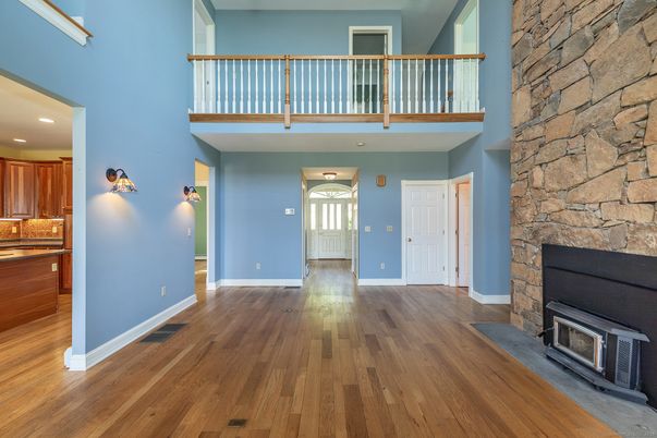 Fireplace, Interior, Recessed Lighting, Stone Walls, Wood Texture Flooring