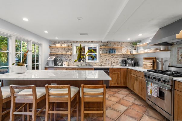 Interior, Kitchen, Recessed Lighting, Stainless Steel Appliances, Stone Walls