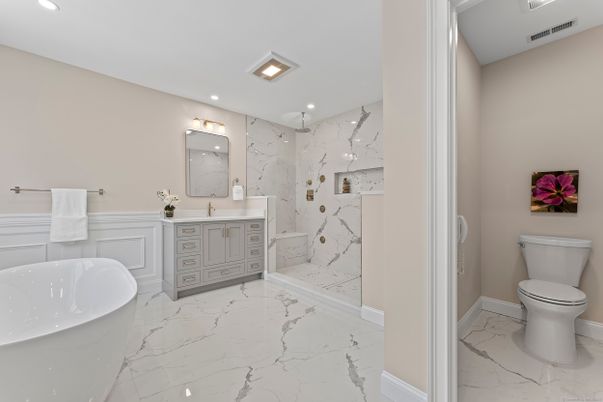 Bathroom, Dual Sink Vanities, Free Standing Baths, Interior, Marble, Marble Walls, Recessed Lighting