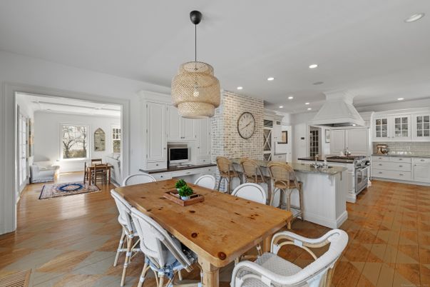 Dining room, Interior, Kitchen, Pendant Lights, Recessed Lighting, Stainless Steel Appliances, Stone Walls, Wood Texture Flooring