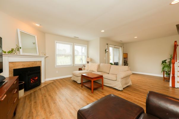 Fireplace, Interior, Living room, Recessed Lighting, Wood Texture Flooring