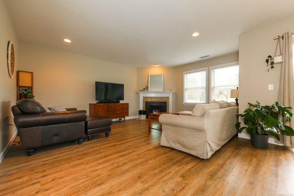Fireplace, Interior, Living room, Recessed Lighting, Wood Texture Flooring