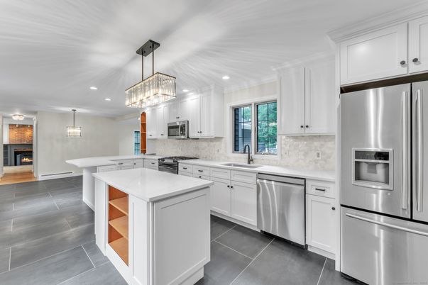 Fireplace, Interior, Kitchen, Pendant Lights, Recessed Lighting, Stainless Steel Appliances