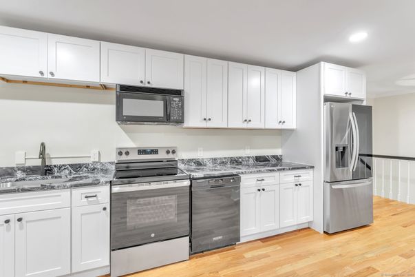 Interior, Kitchen, Recessed Lighting, Stainless Steel Appliances, Wood Texture Flooring