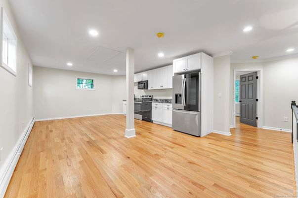 Interior, Kitchen, Recessed Lighting, Stainless Steel Appliances, Wood Texture Flooring
