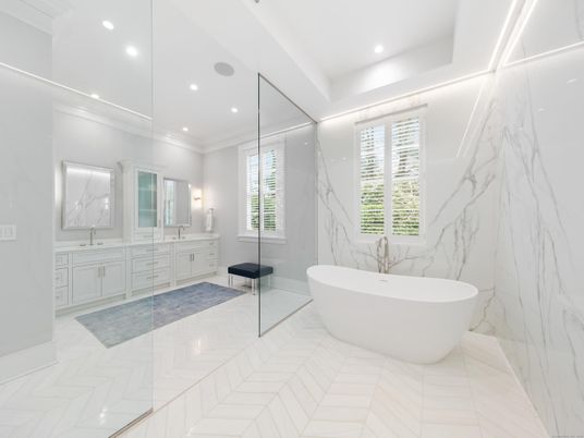 Bathroom, Dual Sink Vanities, Free Standing Baths, Glass Shower, Interior, Marble, Marble Walls, Recessed Lighting