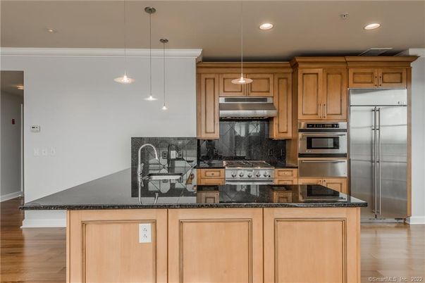 Interior, Kitchen, Pendant Lights, Recessed Lighting, Stainless Steel Appliances, Wood Texture Flooring