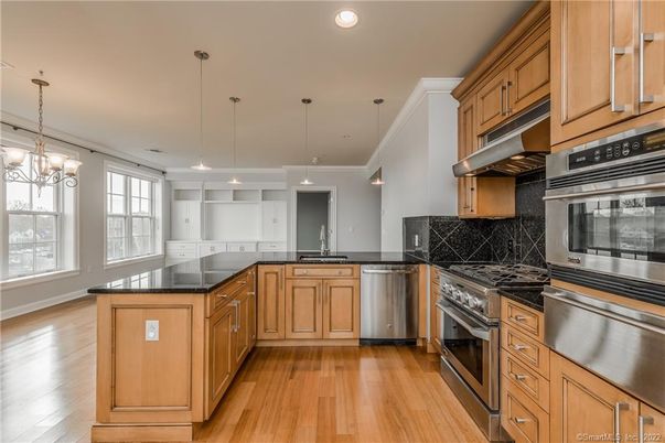 Interior, Kitchen, Pendant Lights, Recessed Lighting, Stainless Steel Appliances, Wood Texture Flooring