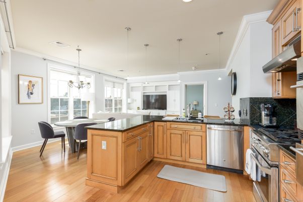 Dining room, Interior, Kitchen, Pendant Lights, Recessed Lighting, Stainless Steel Appliances, Wood Texture Flooring