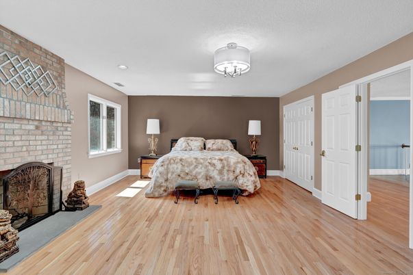 Bedroom, Fireplace, Interior, Stone Walls, Wood Texture Flooring