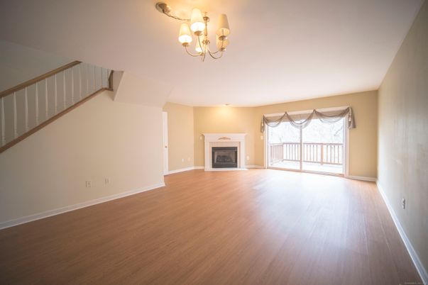 Chandelier, Empty room, Fireplace, Interior, Wood Texture Flooring