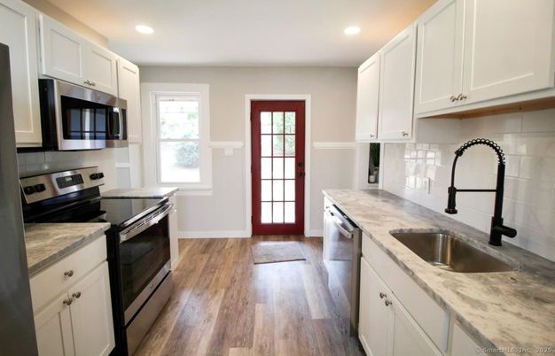 Interior, Kitchen, Recessed Lighting, Stainless Steel Appliances, Wood Texture Flooring