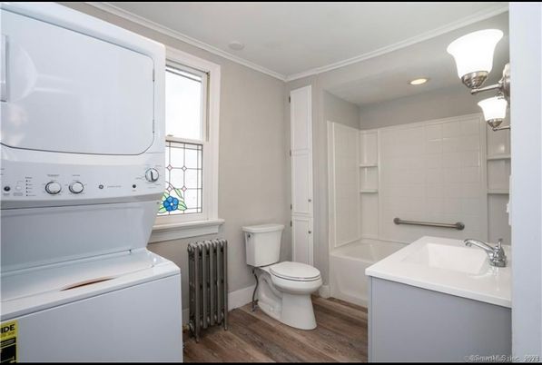 Bathroom, Interior, Recessed Lighting, Utility Closets, Washer, Wood Texture Flooring