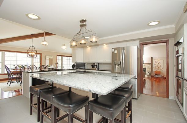 Chandelier, Dining room, Interior, Kitchen, Pendant Lights, Recessed Lighting, Stainless Steel Appliances, Wood Texture Flooring