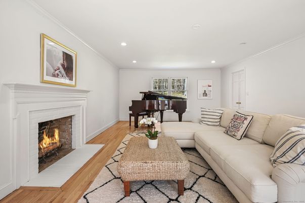 Fireplace, Interior, Living room, Piano, Recessed Lighting, Wood Texture Flooring
