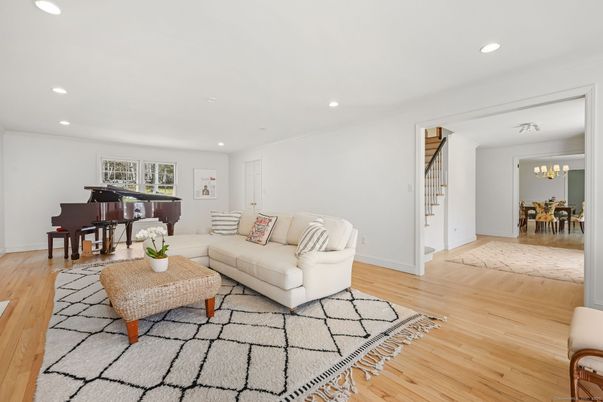 Chandelier, Dining room, Interior, Living room, Piano, Recessed Lighting, Wood Texture Flooring