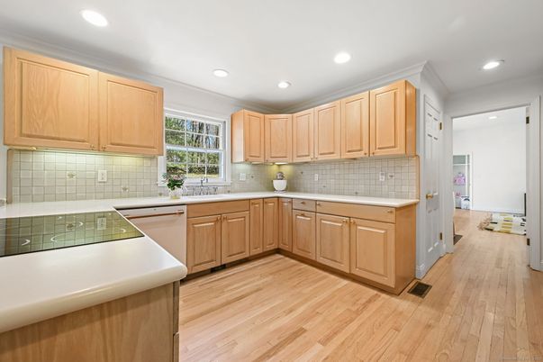 Interior, Kitchen, Recessed Lighting, Tile Countertops, Wood Texture Flooring