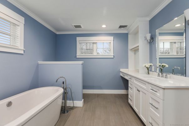 Bathroom, Dual Sink Vanities, Free Standing Baths, Interior, Recessed Lighting, Wood Texture Flooring