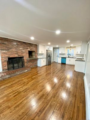 Fireplace, Interior, Kitchen, Pendant Lights, Recessed Lighting, Stone Walls, Wood Texture Flooring