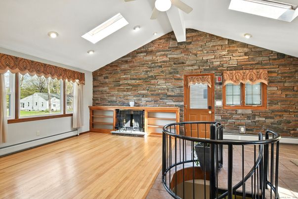 Fireplace, Interior, Recessed Lighting, Stone Walls, Wood Texture Flooring