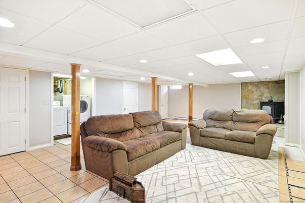 Fireplace, Interior, Living room, Recessed Lighting, Stone Walls, Washer