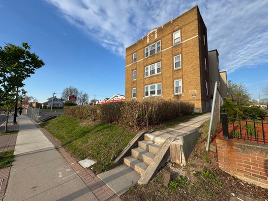 Exterior, Facade, Brick Facade, Condo Building