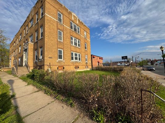 Exterior, Facade, Brick Facade, Condo Building