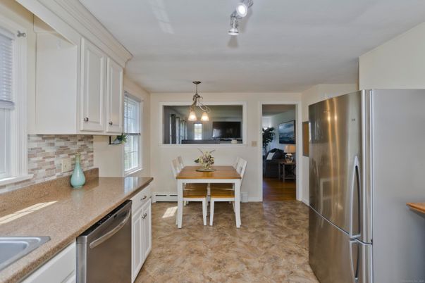 Dining room, Interior, Kitchen, Pendant Lights, Stainless Steel Appliances, Wood Texture Flooring