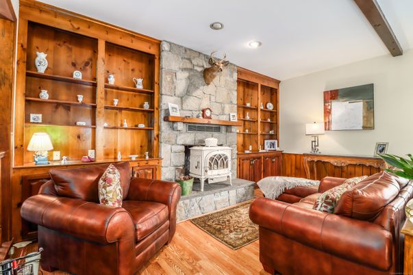 Fireplace, Interior, Living room, Recessed Lighting, Stone Walls, Wooden Beams, Wood Texture Flooring