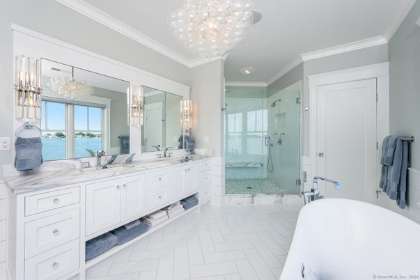 Bathroom, Chandelier, Dual Sink Vanities, Free Standing Baths, Glass Shower, Interior, Marble, Pendant Lights, Recessed Lighting