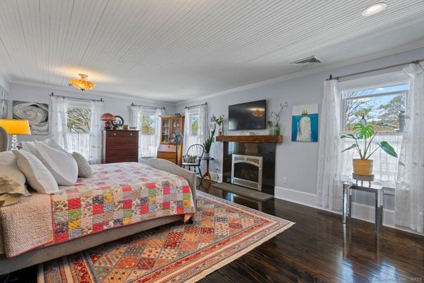 Bedroom, Fireplace, Interior, Recessed Lighting, Wood Texture Flooring