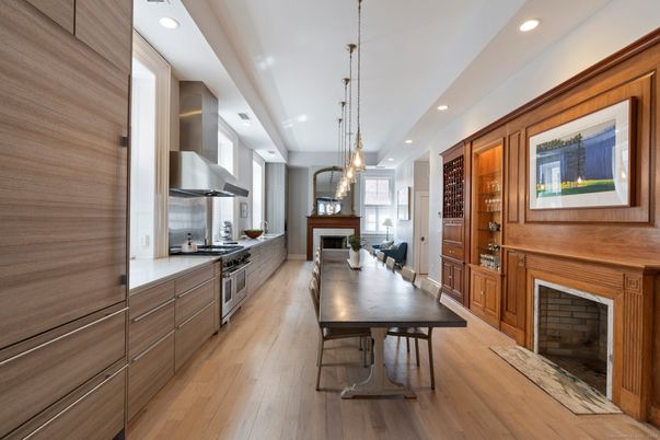 Dining room, Fireplace, Interior, Kitchen, Pendant Lights, Recessed Lighting, Stainless Steel Appliances, Wood Texture Flooring