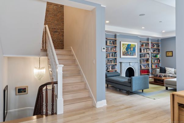 Fireplace, Interior, Living room, Pendant Lights, Recessed Lighting, Stone Walls, Wood Texture Flooring