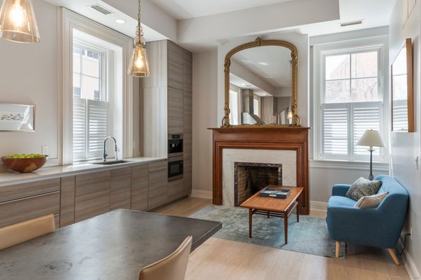 Fireplace, Interior, Kitchen, Living room, Pendant Lights, Recessed Lighting, Stainless Steel Appliances, Wood Texture Flooring