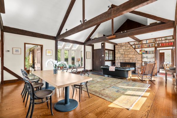 Dining room, Fireplace, Interior, Living room, Stone Walls, Wooden Beams, Wood Texture Flooring